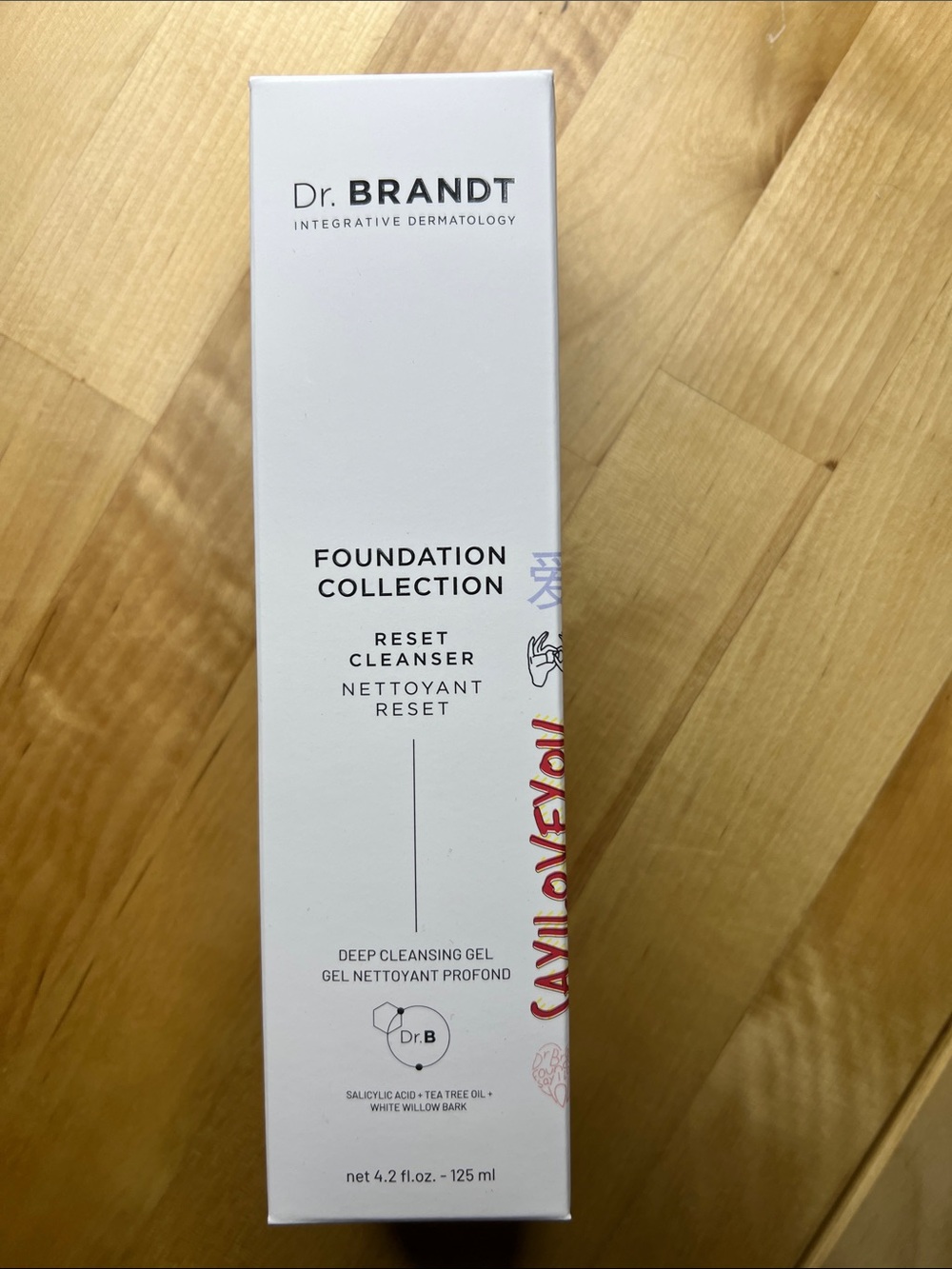 Dr. Brandt Reset Cleanser White with Red Accent Packaging